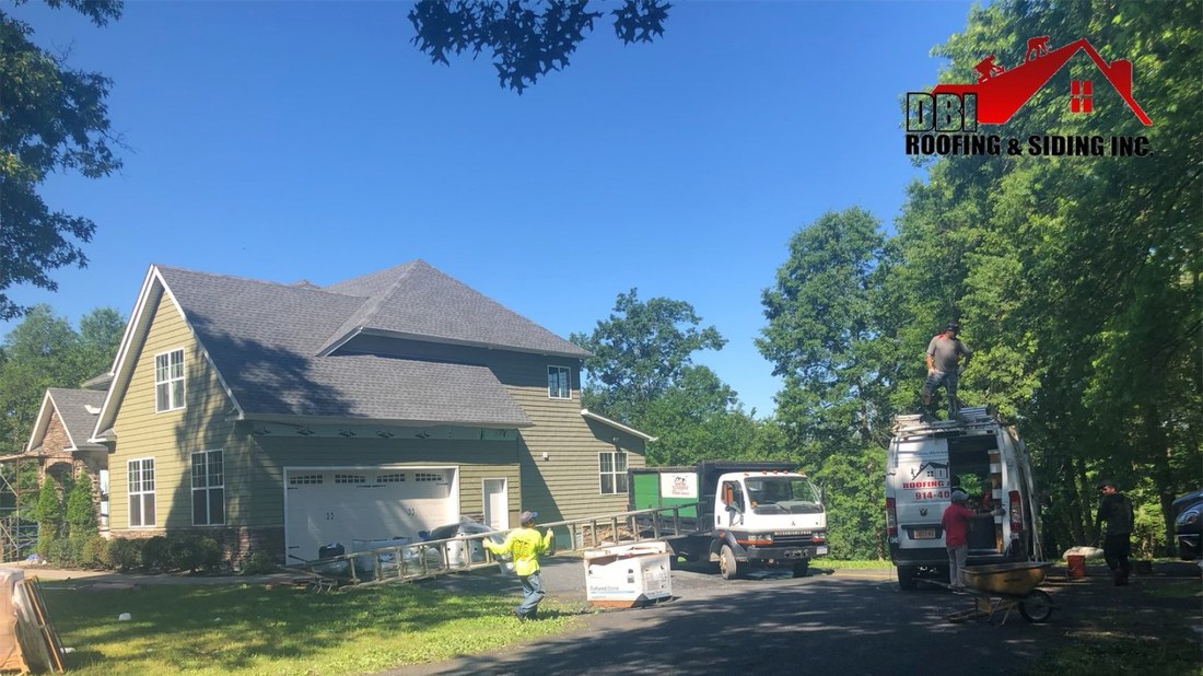 DBI crew replacing a roof on a Hudson Valley home